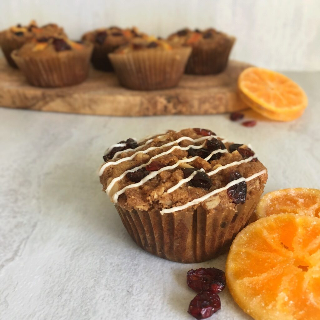 orange cranberry streusel muffins with vanilla glaze